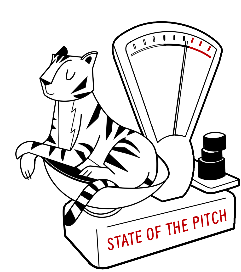 A scale comparing the weight of a tiger to some stacked weights. A label on the scale reads state of the pitch.